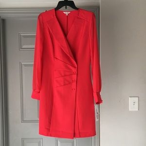 Nanette Lepore red dress with sheer sleeves.